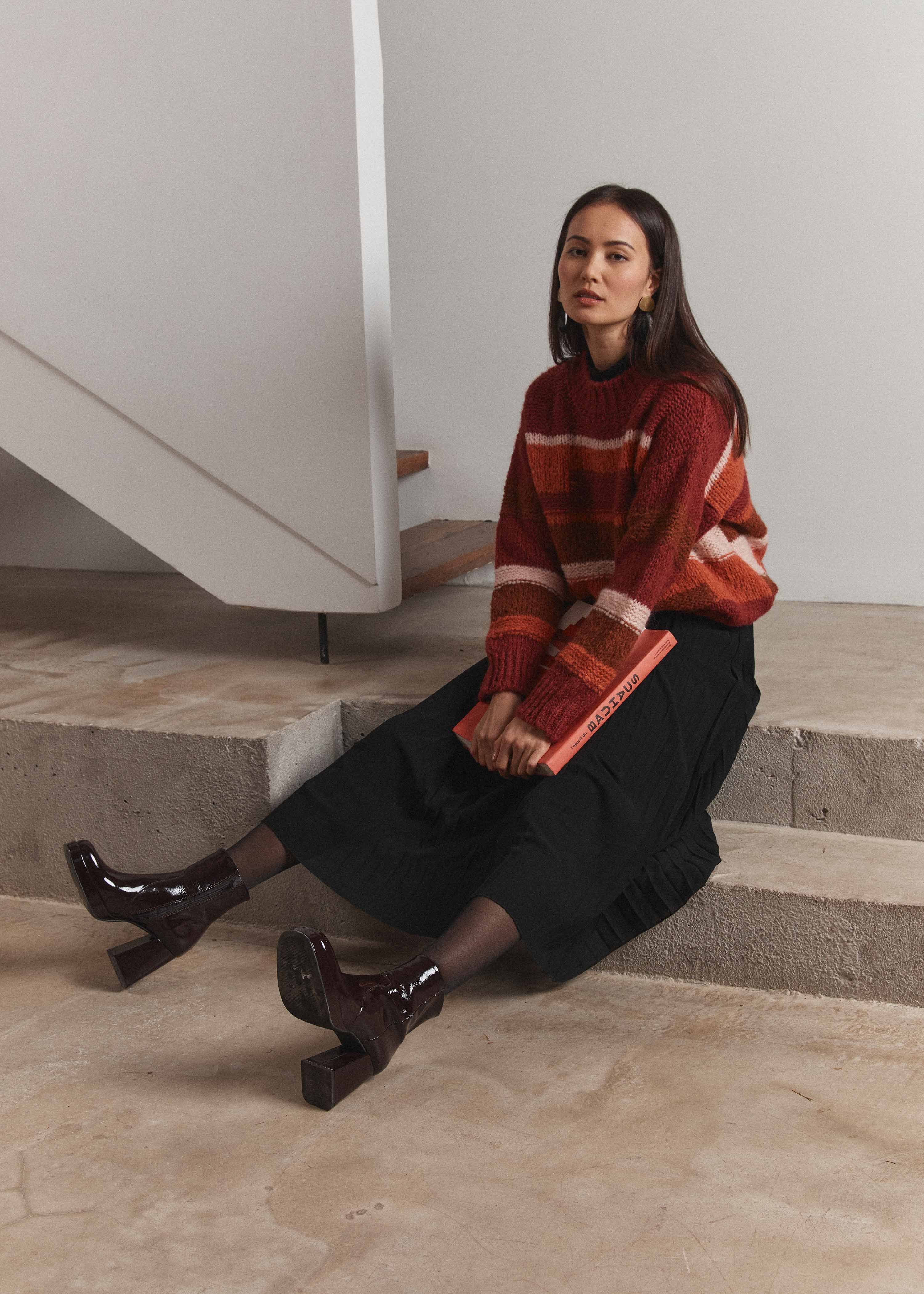 Pull orange à rayures manches longues