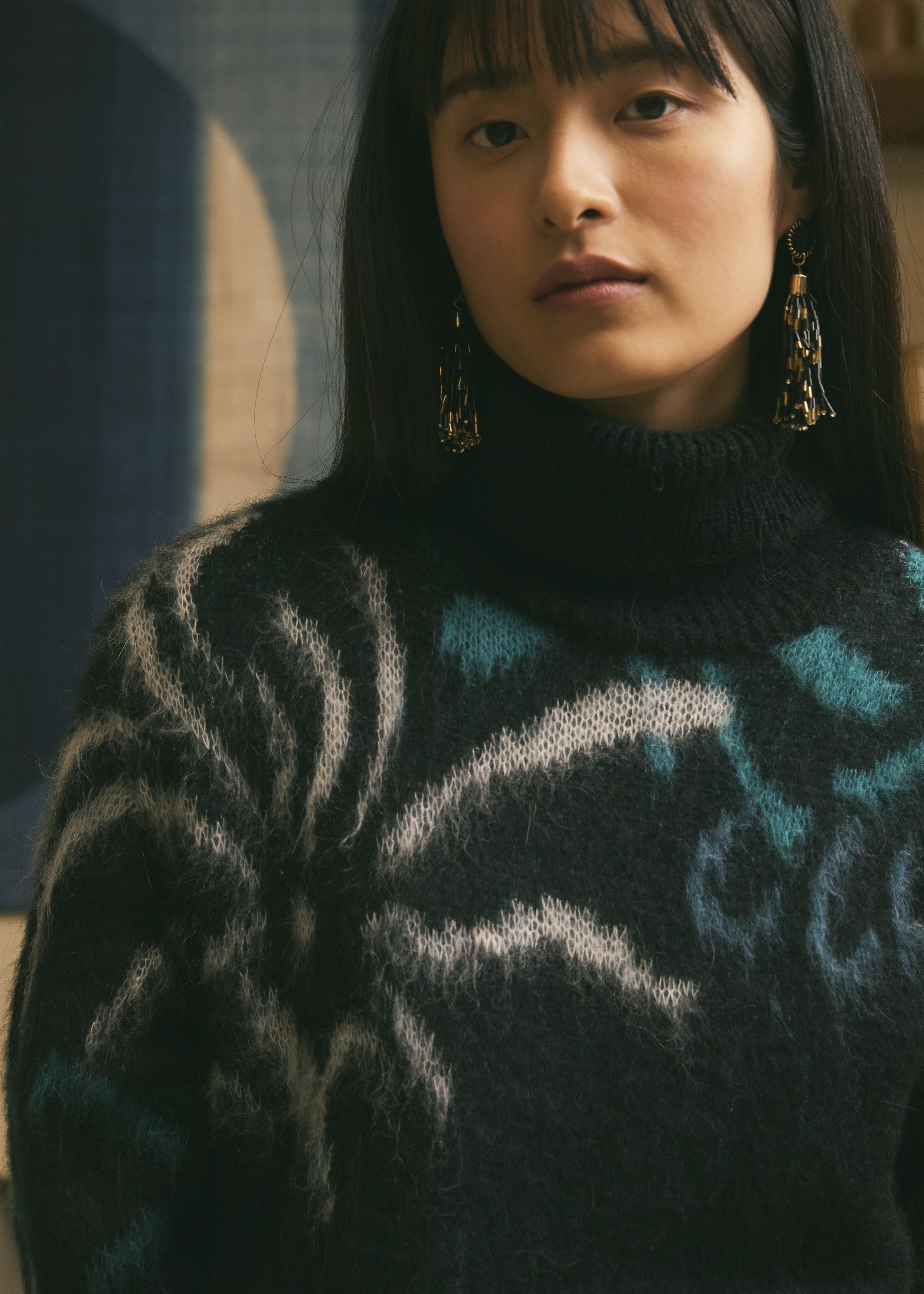 Pull noir motif jacquard manches longues col roulé