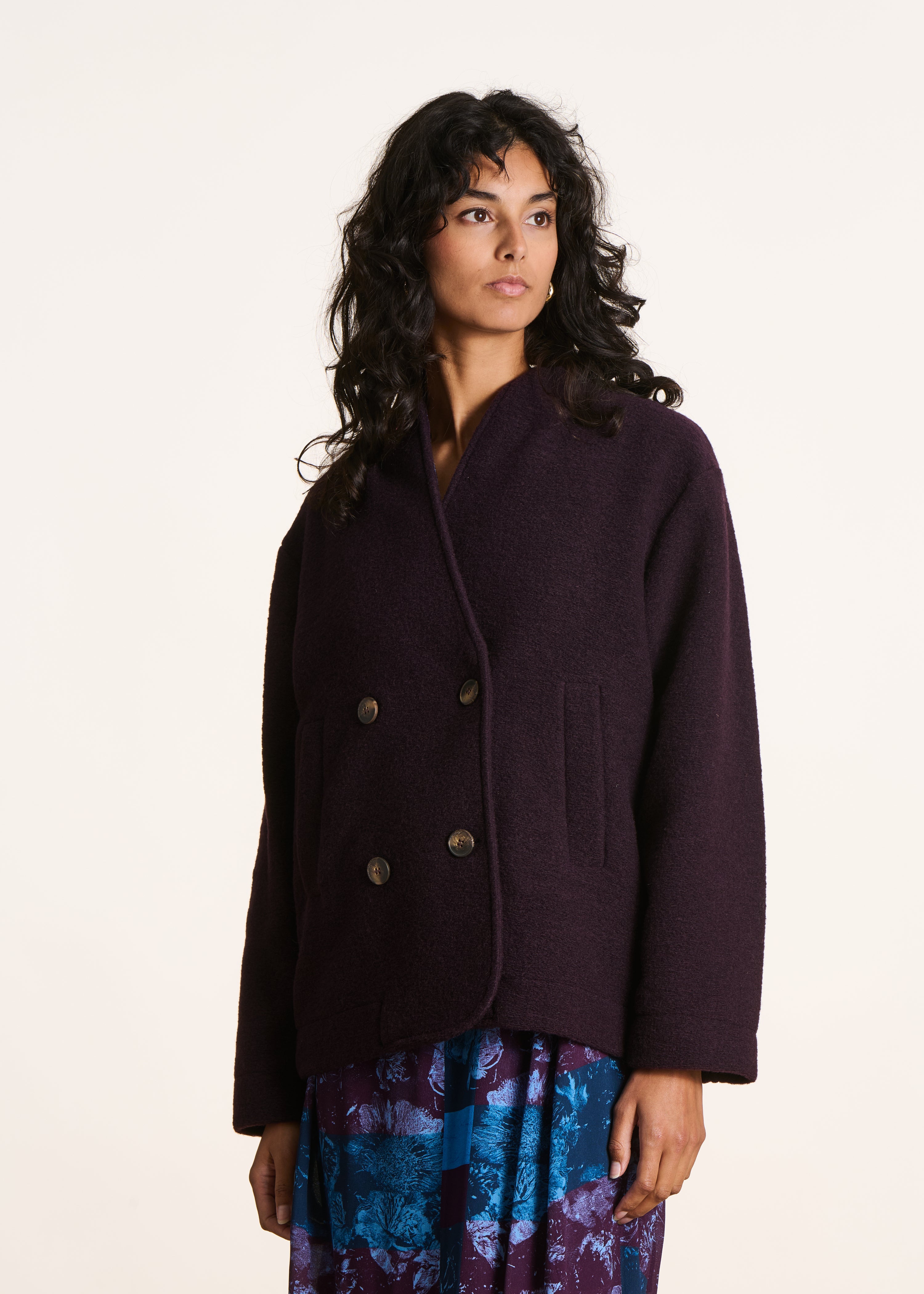 Manteau court en maille bouillie